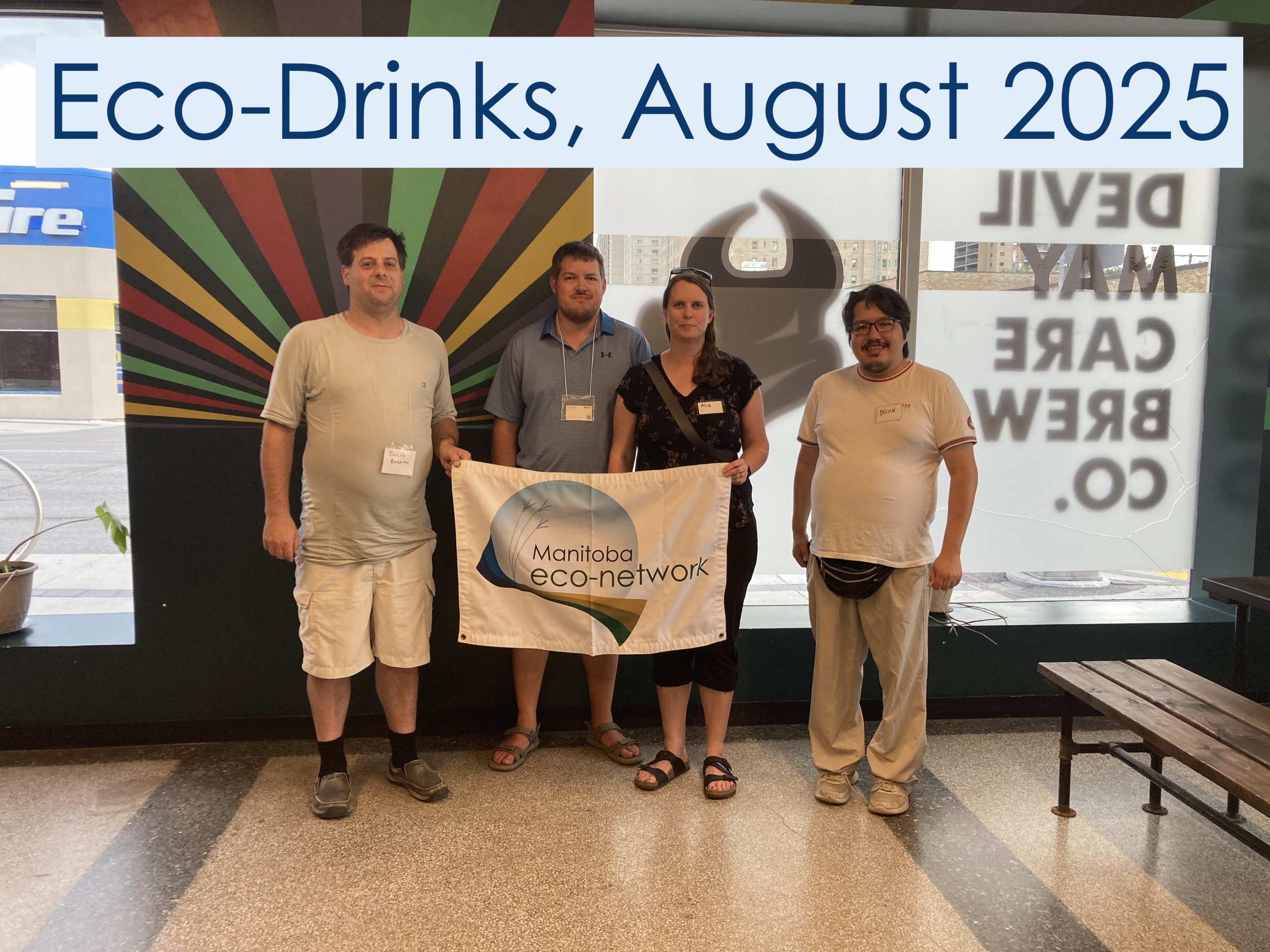Eco-Drinks, July 2025. They are holding a Saved Lemay sign in front of the group.